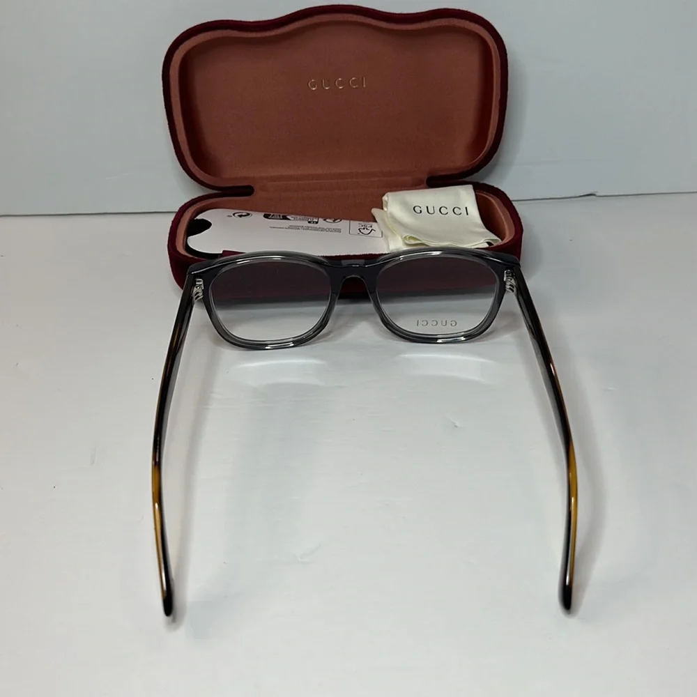 New- Auth - Gucci's GG0004ON soft lines across frames front.Iconic web effect…